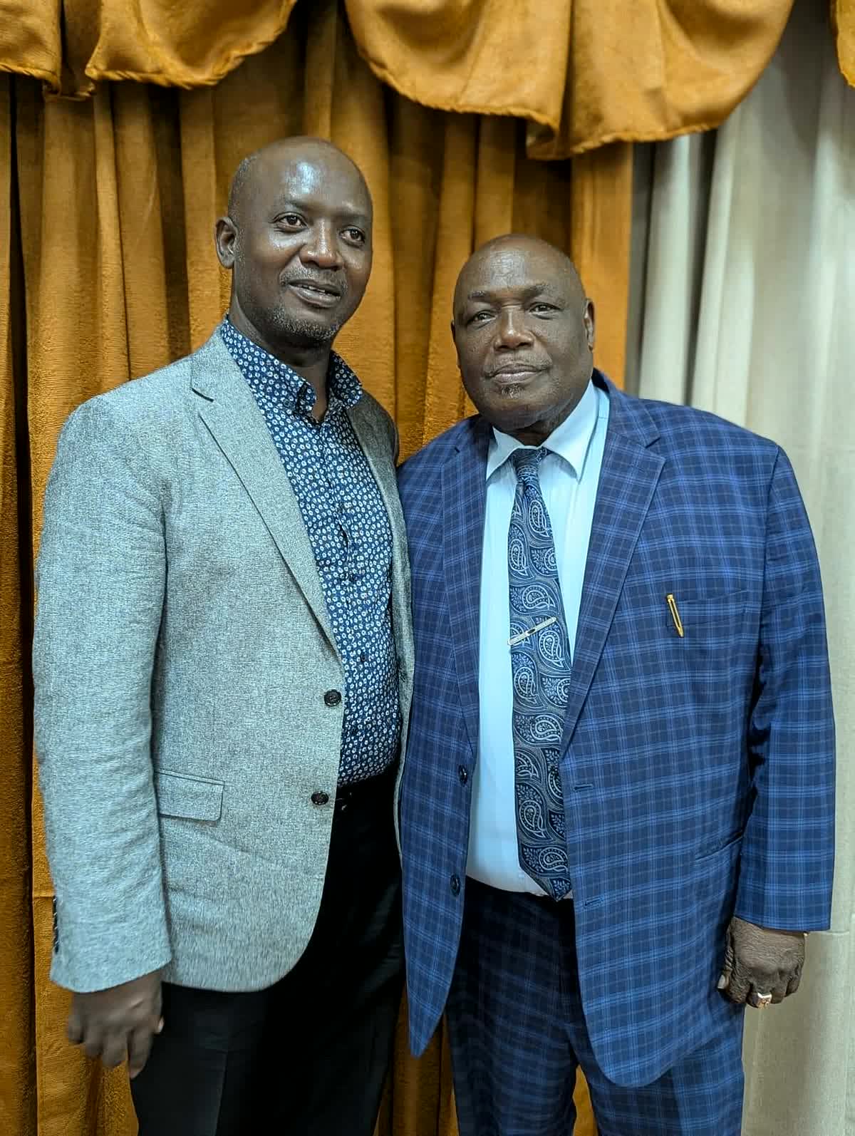 Apostle Lambert with a minister in Castries